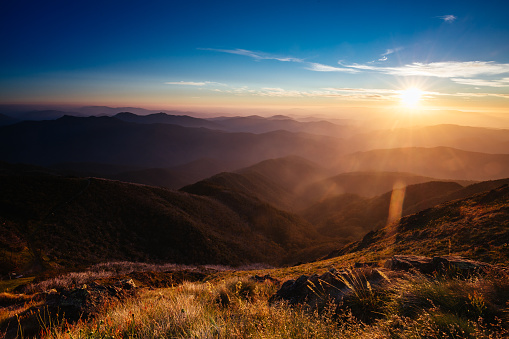 The view at sunset from the summit of Mt Buller over the Victorian Alps in the Victorian High Country, Australia