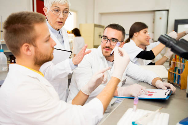 istock Students of chemistry working in laboratory 1141232558
