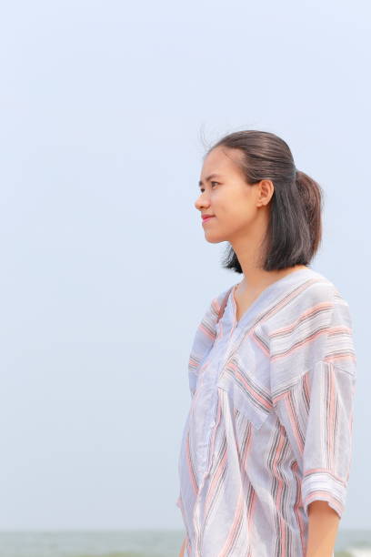 istock young woman at Samson beach in Vietnam 1141232707