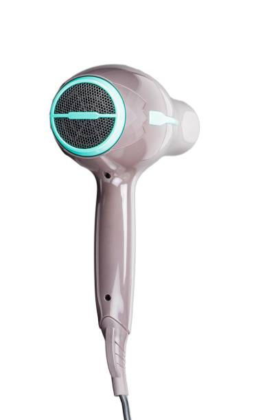 istock Brown hair dryer with green elements isolated on the white background 1141234940