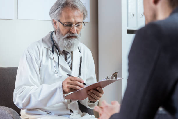 istock Doctor counseling patient 1141237768