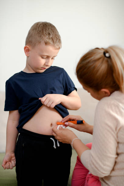 istock Cute child taking an insulin shot 1141238848