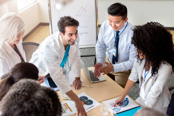 istock Cheerful doctor discusses something during meeting 1141239132