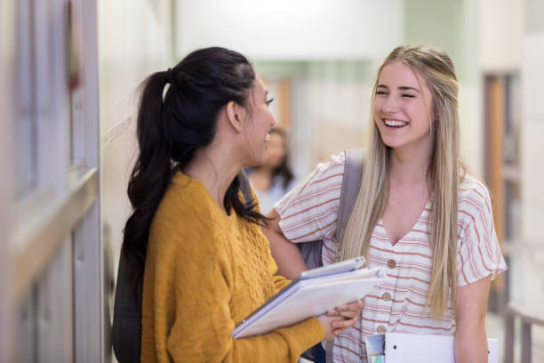 istock Friends share a laugh at school 1141239366