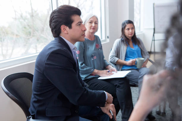 istock Businessman concentrates during meeting 1141239451