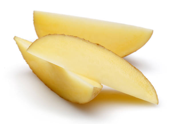 Fresh potato slices isolated on white