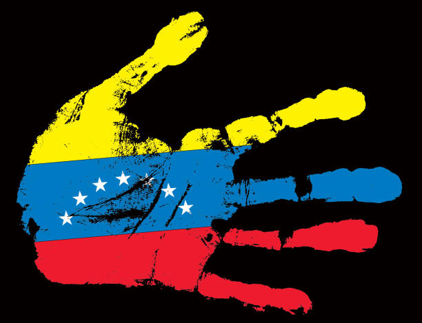 istock handprint image with Venezuela flag closeup 1141241002