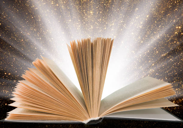 istock image of open book on shiny background 1141241199