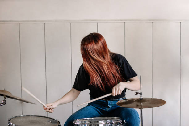 istock Female Drummer On Rehearsal 1141242387