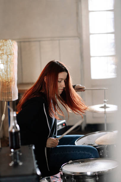 istock Female Drummer On Rehearsal 1141242490
