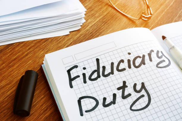 istock Fiduciary duty handwritten by marker on a note. 1141247705