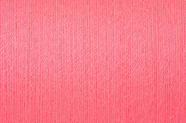 istock Macro picture of soft pink thread texture background 1141249535