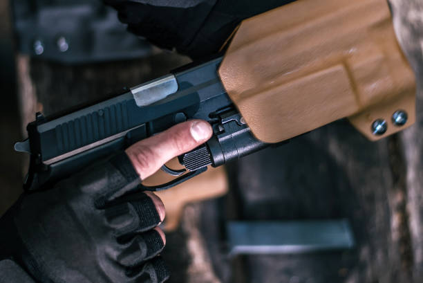 istock sports shooting instructor check your weapons close-up 1141250300