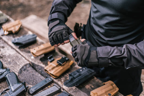 istock sports shooting instructor check your weapons close-up 1141250335