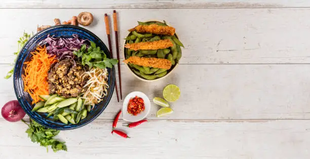 Top view composition of Bun bo nam bo vietnamese food in bowl, free space for text