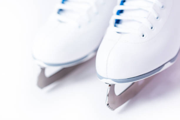 istock New white figure skates on a white background. 1141250633