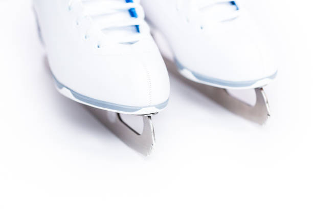 istock New white figure skates on a white background. 1141250733