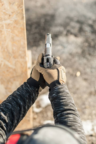 istock Shooting on target in shooting range. Back close-up detail view 1141251451