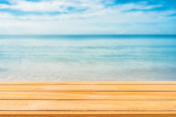 istock Abstract image of Empty wooden table with blurred background. 1141251518