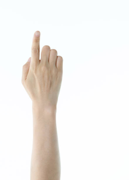 istock Woman hand pointing on white background 1141251556