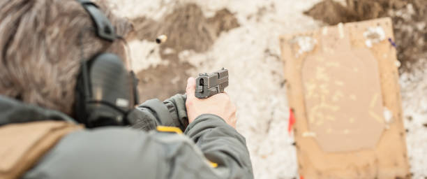istock Shooting on target in shooting range. Back close-up detail view 1141251805