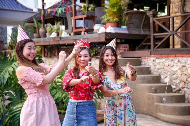 istock Friends celebrating birthday party at pool 1141253079