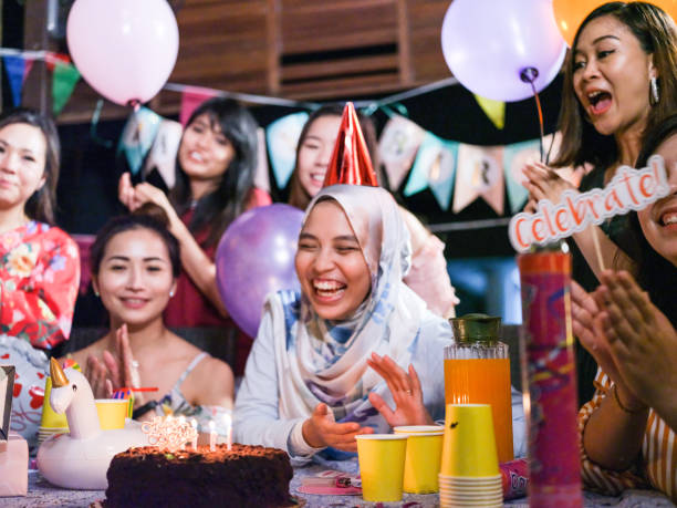 istock Friends celebrating birthday party 1141253160
