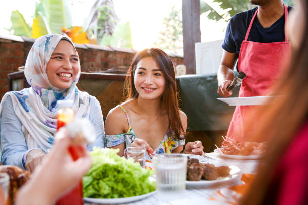 istock Friends celebration and eating 1141253563