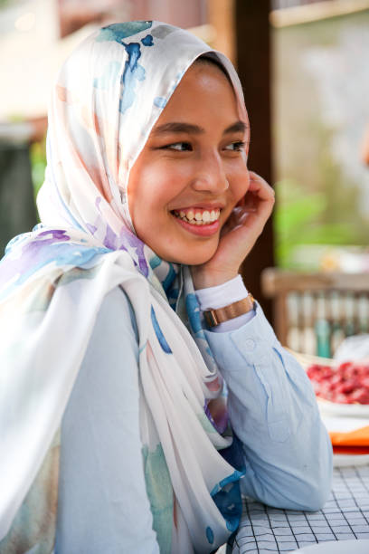 istock One girl with hijab smiling and laughing 1141253646