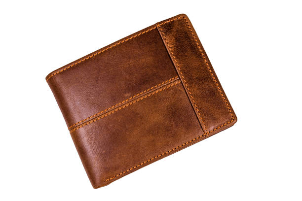 istock Closed brown leather wallet isolated on a white background 1141254173