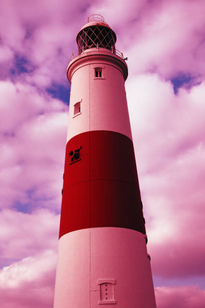 Lighthouse with fair weather Lighthouse with fair weather at Portland Bill, The Isle of Portland, Dorset, UK uncompromising stock pictures, royalty-free photos & images