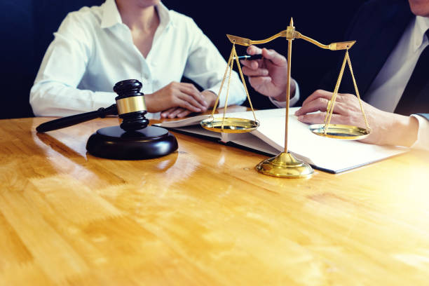istock Lawyer or judge gavel with balance work 1141255356