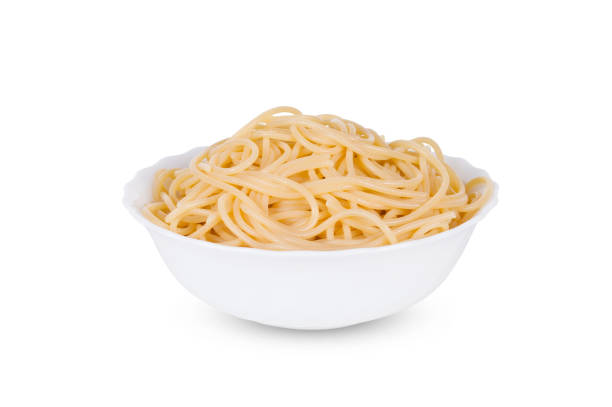 istock Tasty Pasta in bowl isolated on white background. 1141255486