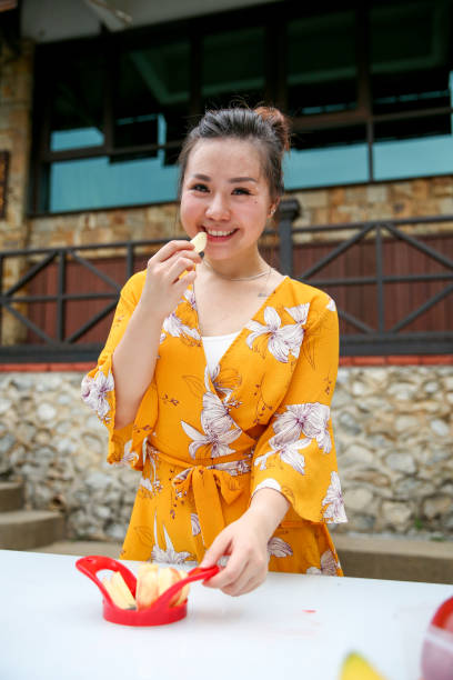 istock Friends preparing food for celebration 1141255999