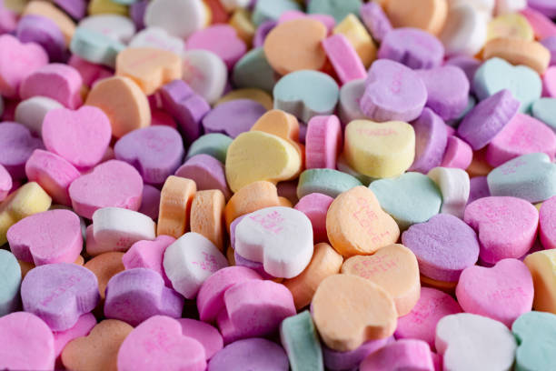 istock An assortment of conversation hearts top side view. 1141256357