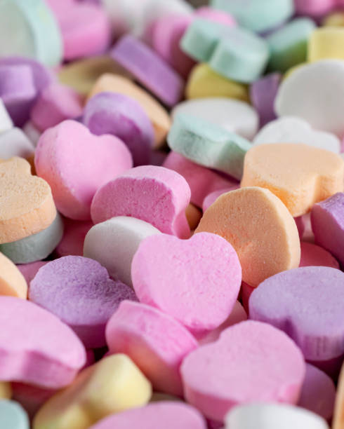 Assortment of candy hearts. Assortment of candy hearts.  Blurry background. circa 14th century photos stock pictures, royalty-free photos & images