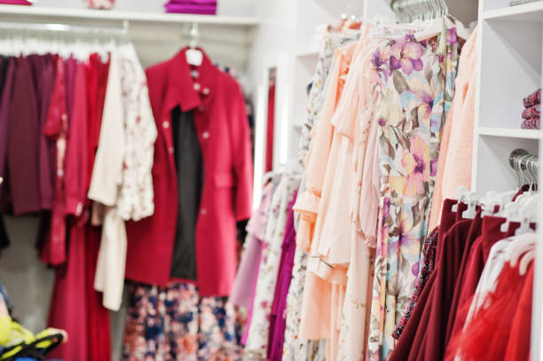 Luxurious evening night out sparkling dresses hanging on the rack. High fashion concept, haute couture, designer
