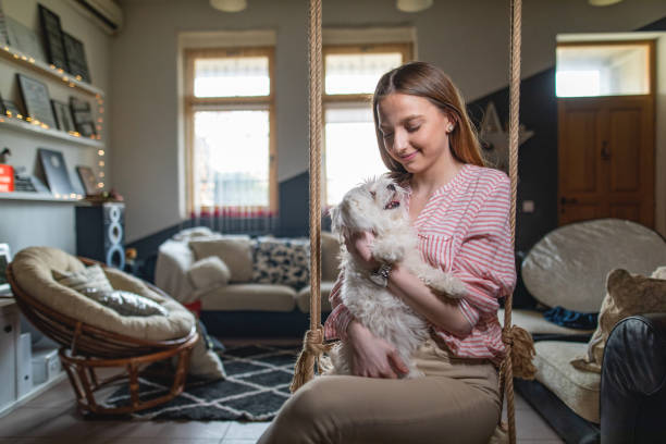 istock Gorgeous girl bonding with her dog 1141261125