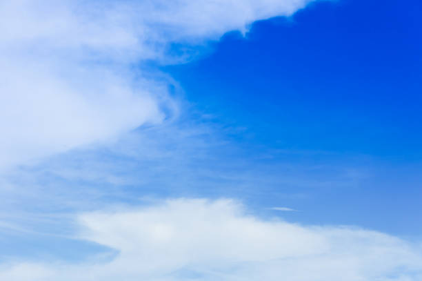 istock Beautiful white fluffy clouds in the blue sky day, cloud day. It best for background, abstract or blur. 1141263871