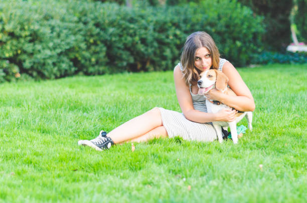 istock Young woman and her dog 1141265492
