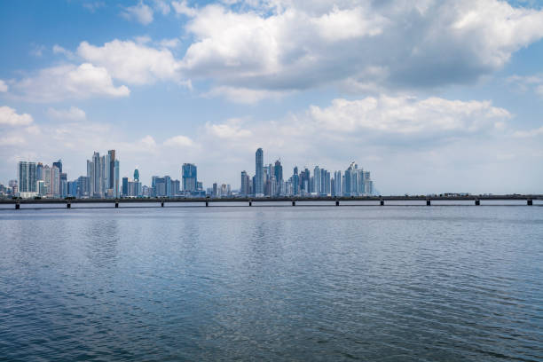 panama city skyline view with highway above the ocean and beautiful cloudscape in panama.