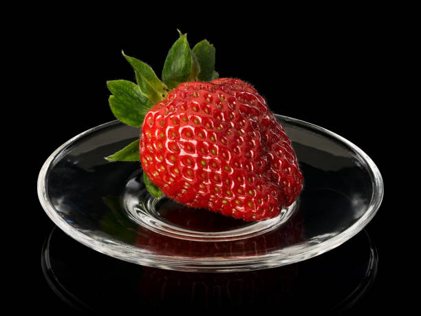 istock Strawberry on glass saucer 1141273589