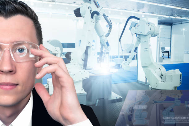 istock The engineer uses a glasses with augmented reality to control robots in a smart factory. 1141280154