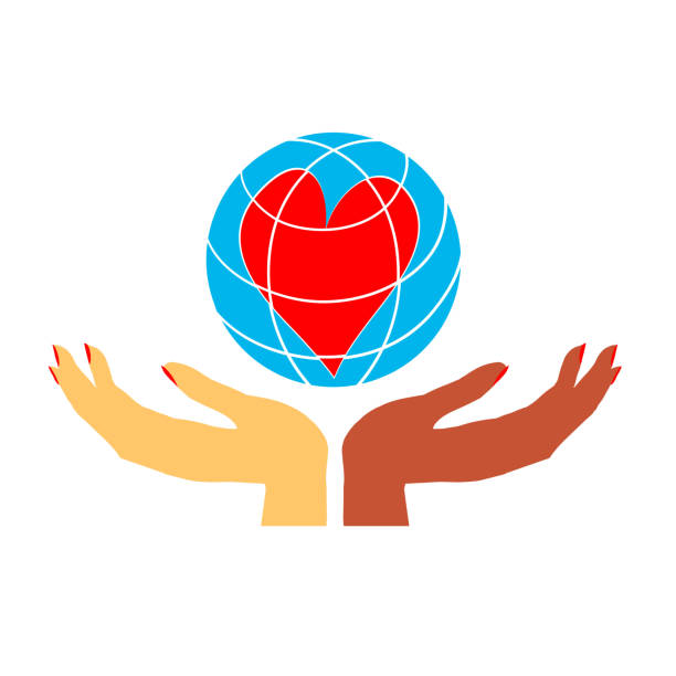 istock Two hands, women's hands different flowers hold the globe with the heart. 1141281872