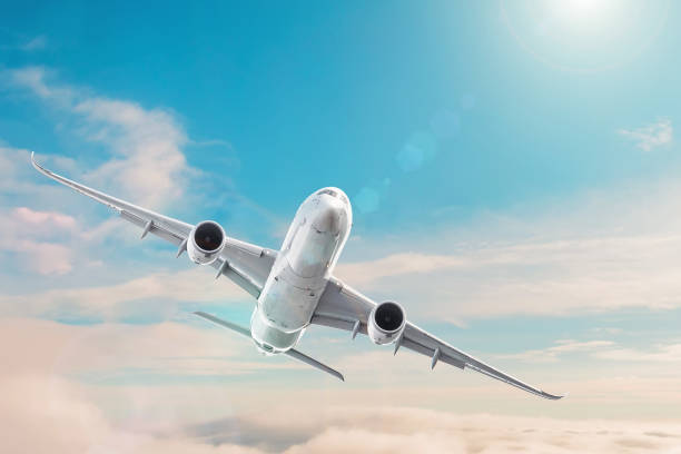 istock Passenger plane flying in the daytime sky overcast, cloudscape. 1141282445