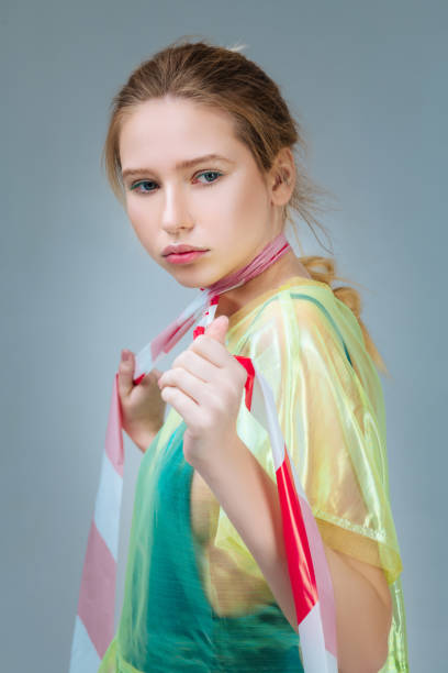 istock Model wearing plastic coat posing with strip on neck 1141285557