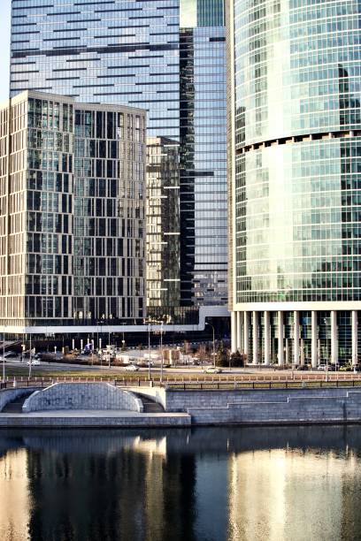 istock Office and residential skyscrapers reflected in the water 1141285966