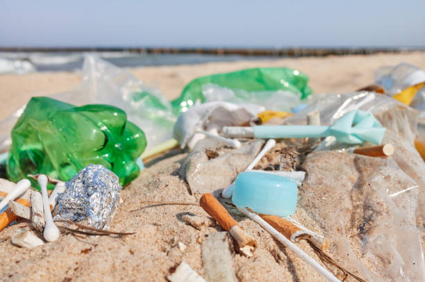 istock Close up picture of garbage left on a beach. 1141290039