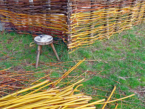 fence in work made with willow branches