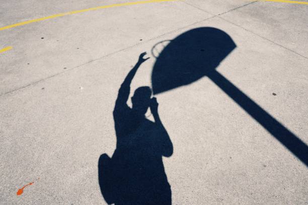 istock man shadow silhouette on the ground 1141293596